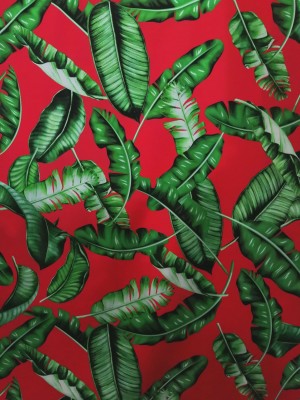 Seda Poliéster/Lycra Tropical Folhas Verdes Fundo Vermelho